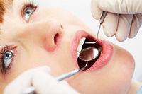What Causes Gums to Turn Purple or Brown?