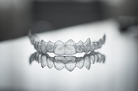 Invisalign aligner for correcting crossbite, reflecting dental treatment options at Water Tower Dental Care.